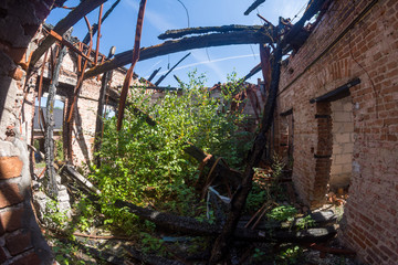 Burned house. Fire damage. A site of fire.