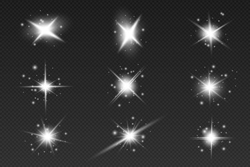 Obraz premium White sparks glitter special light effect. Vector sparkles on transparent background. Christmas abstract pattern. Sparkling magic dust particles