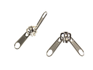 Two metal clasps from a double-sided zipper close-up isolated on a white background. Zipper ykk white metal.
