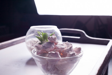 handmade marshmallow in the form of roses in a gift box close-up.