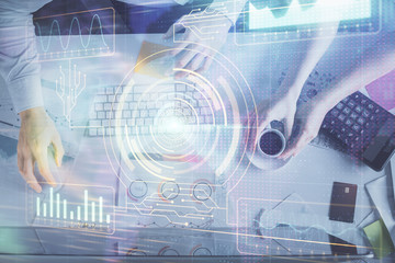 Double exposure of man and woman working together and data theme hologram drawing. Computer background. Top View.