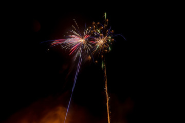 Long exposure of fireworks in the sky.