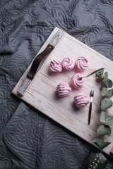 handmade marshmallow in the form of roses close-up.
