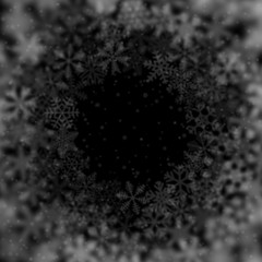 Christmas background of snowflakes of different shape, blur and transparency, arranged in a circle, on black background