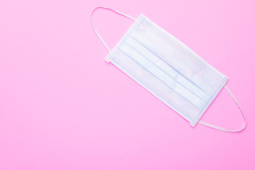 New protective face mask on bright pink background