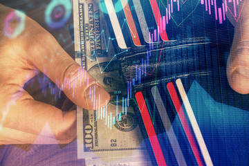 Multi exposure of forex graph drawing hologram and USA dollars bills and man hands. Technical Analysis concept.