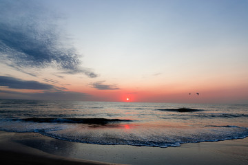 Obraz premium Sunrise on the beach