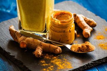 golden milk with turmeric paste. healthy food