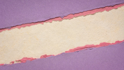 colorful paper abstract with a copy space - sheets of bark and cotton rag paper