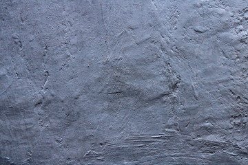 cracked weathered cement wall texture in cyan color