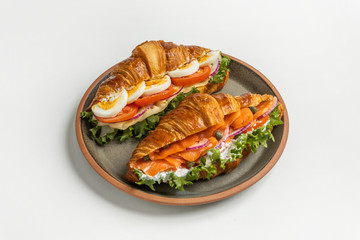 Fototapeta na wymiar クロワッサンのサンドウィッチ　Croissant ham sandwich with cheese