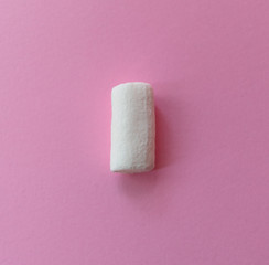 marshmallows on a pink
 background