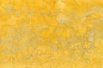 Old vintage background covered in yellow paint