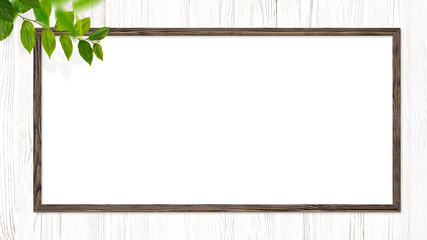 Picture frame hung on a white wooden wall