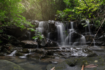 Naklejka premium Beautiful waterfall in green forest in jungle, Wangtakang waterfall, Prachinburi, Thailand.