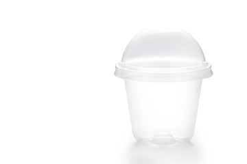 Empty disposable plastic cup isolated on white background.Container for juice, milkshake and lemonade.