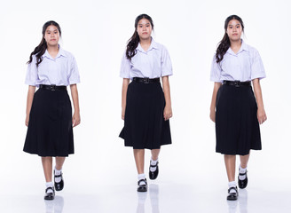 Obraz premium asian girl in student uniform white shirt black skirt shoes white isolated