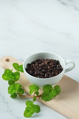 Coffee cups and beans, international coffee day concept