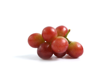 Fresh red grape isolated on white background