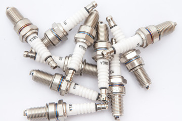 Spark plug composition on white background