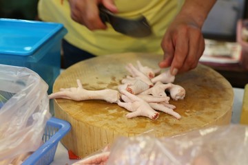 hands of a woman preparing dough