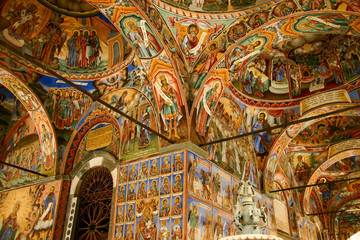 Rila, Bulgaria - Jan 29, 2007: Outer corridor with beautiful frescoes in the Rila Monastery