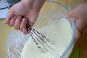 Cooking dough. Stir the dough with a whisk. Stirring whisk dough.