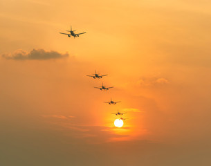 Airplane landing at sunset. Multi Exposure Technique in Photography