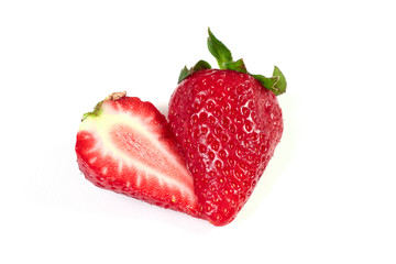 Red Strawberries with leaves. Isolated on a white background.