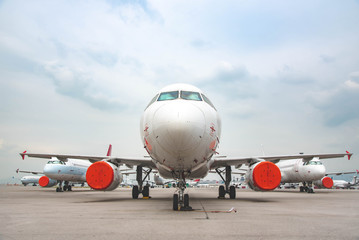 Due to Coronavirus Covid-19 airline fleet parked at the taxiway of Airport 