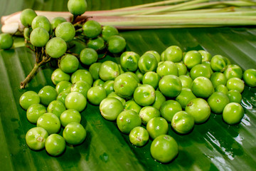 Eggplant on green banana leaf