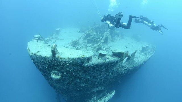 Technical scuba divers using side mount configuration on the ship wreck SS Thistlegorm