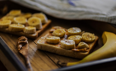 wooden tray with peanut butter sandwiches