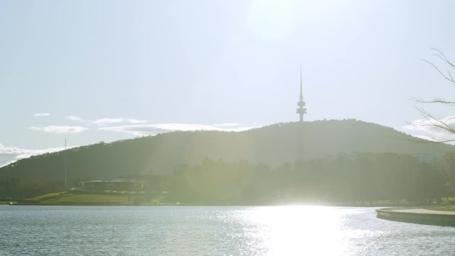 Panning shot of view of Lake Burley Griffin and Telstra Tower, Canberra