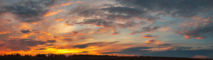 Multi-colored clouds in the rays of light