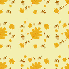 Fototapeta premium Seamless pattern background of falling brown leaves and Acorn on a yellow background. Concept of fallen leaves in autumn season