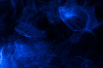 Blue steam on a black background.