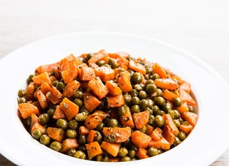 Fried  carrots  with green peas in plate , in door  Chiangmai  Thailand