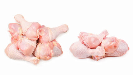 Tasty raw chicken legs. Top view. Isolated on white