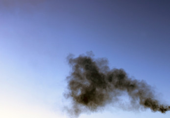 black smoke in the sky