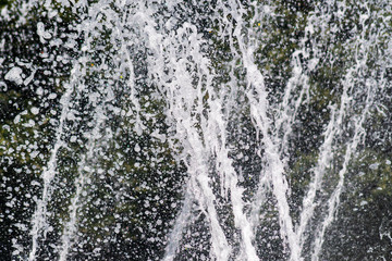 Close up of waterfall in the city pond