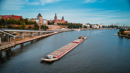 Boat floating on river in the city, Szczecin