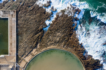 Newcastle Baths - Newcastle NSW Australia. Aerial view of the Canoe Pool a famous landmark in the seaside city.