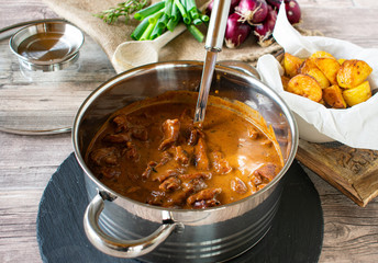 braised Ragout in a Pot served with Potatoes as a side dish from above