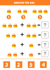 Addition math game with cute cartoon Halloween candy.