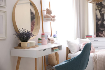 Teenage girl's bedroom interior with stylish furniture. Idea for design