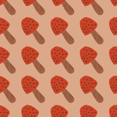 Stylized forest print seamless mushroom pattern. Creative amanitas simple silhouettes in red tone on beige background.