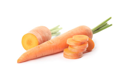Whole and cut ripe carrots isolated on white