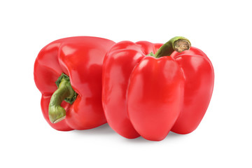 Ripe red bell peppers isolated on white
