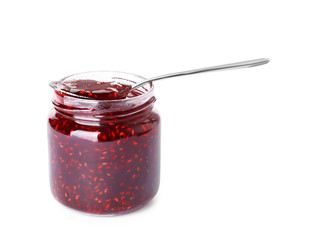 Jar of raspberry jam isolated on white